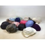A quantity of vintage hats. Including mid century through to 1980s