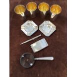 Silver gentlemans items, to include a pair of ash trays, retractable pencil, drinking cups,