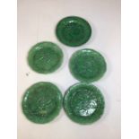 Five nineteenth century green majolica plates - four cucumber plates and one other