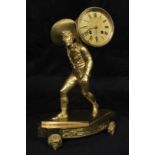 A continental cast gilded mantel clock showing a well-dressed man, oyster seller, carrying a basket.