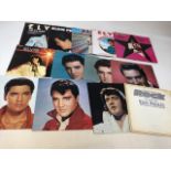 A box of LP records including Elvis, Bob Dylan, The Moody Blues See photos for titles