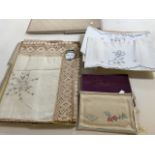 A vintage Irish linen embroidered table cloth in original box, also with a boxed embroidered tray