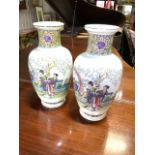 A pair of Japanese style transfered porcelain vases. H:36cm