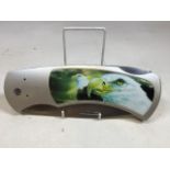 A large shop display penknife with eagle motif W:25cm x H:9.5cm