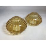 A pair of vintage amber glasses lamp shades W:30cm x H:21cm
