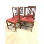 A set of four oak dining chairs with drop in seats, early 20th century. H:46cm