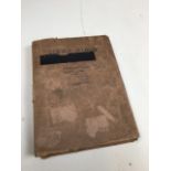 A vintage childs stamp album - partially filled