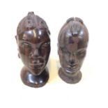 Two African hardwood carved heads. H:19cm