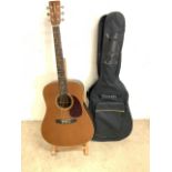 A Tanglewood acoustic guitar. With case.