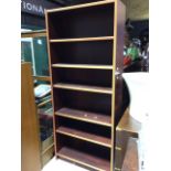 A tall Danish free standing book case with five shelves W:83cm x D:31.5cm x H:194cm