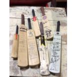A quantity of signed cricket bats - Somerset, Essex, and others