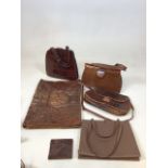 A quantity of crocodile skin bags and other items