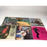 A box of LP records including Cliff Richard, Olivia Newton John, Meatloaf, Beach Boys, Connie