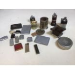 A quantity of smoker related items including cigarette case, lighters and ashtrays