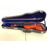 A violin in case. With label Skylark brand Republic of china.