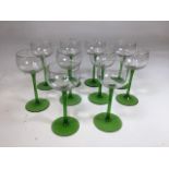 Twelve vintage green stemmed hock glasses