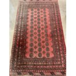 A vintage Afghan Turkoman Khalmohammadi style rug. W:109cm x H:190cm