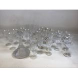 A quantity of Galway Irish Crystal including a decanter and glasses. Includes, flutes, coupes, three