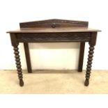 An 18th-19th century carved hall table, with hidden drawer to front, bobbin turned front legs with