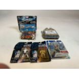 Star Wars figures, Micro machines, a cup cake kit and 2005 pin collection