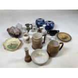 A box of ceramics including New Devon Pottery items - piggy bank, tankard, jug, vase, a pottery lamp