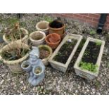 A collection of stoneware planters etc.