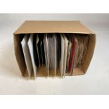 A box of 45s including Adam Faith, The Rolling Stones, Elvis, Billy Fury, Small Faces, Eddie Cochran