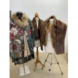 A collection of vintage fur shoulder capes and stoles and a fur trimmed cape by 101 ideas