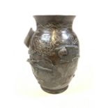 A Japanese 19th century Jeiji period bronze vase with bird and floral decoration. H:22.5cm