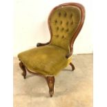 A Victorian button backed bedroom chairs with green valour upholstery. Seater height H:38cm