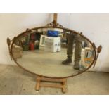 A mid century mirror in metal frame. W:82cm x H:57cm