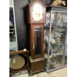 A reproduction grand father clock. H:194cm