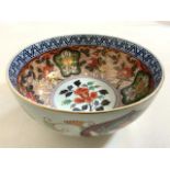 An Oriental eight character bowl W:24.5cm x D:24.5cm x H:10.5cm