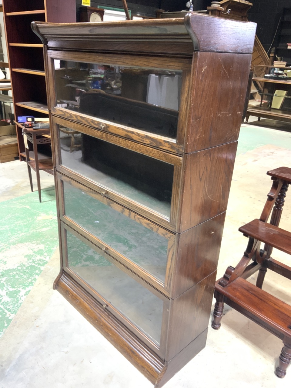 An oak four section Globe Wernicke style book case. No labels. W:88cm x D:34cm x H:142cm - Image 2 of 4