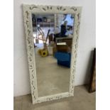 A Modern cream decorative mirror also With a modern print. W:60cm x H:120cm