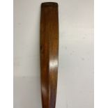 An early 20th century wooden oar. Length 244cm.