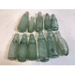 A collection of 11 cod bottles with local interest Exeter, Newton Abbott, Taunton, etc.