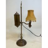 A brass and copper early 20th century students lamp H x 57 cm.