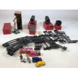 A quantity of Hornby 0 gauge clock work trains, tender, track and signal. Includes two 501