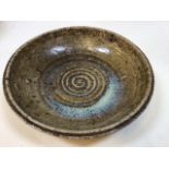 An art pottery bowl by Oxshott pottery, small chip to rim W:27cm x H:6cm