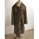 A 1980s Owen Barry Swedish Lamb coat. Size 18 with original receipt