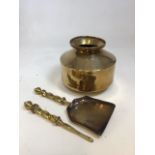 A mid-century brass water pot from Mombasa H: 24cm also with a brass poker and shovel with short