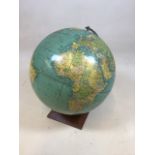 A Phillips globe on wooden a stand H:40cm