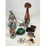 A quantity of ceramics including a large dachshund dog figurine, a Sylvac Dachsund, a Beswick