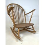 A large Ercol style (No sticker) blonde wood rocker. Seat height H:32cm