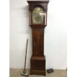A 19th-century oak eight Day long case clock with arched Bros dial two weights and pendulum.