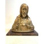 An antique plaster bust of Jesus on wooden plinth. H:47cm