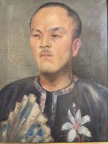 A mid to early 20th century oil on canvas portrait of Tibetan gent, unsigned. In national costume in