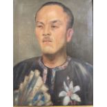 A mid to early 20th century oil on canvas portrait of Tibetan gent, unsigned. In national costume in