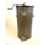 An aluminium honey extractor with label Robert Lee Uxbridge Middlesex England. H:79cm